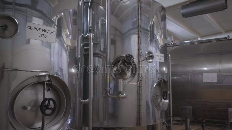 Milk storage tanks in a dairy plant