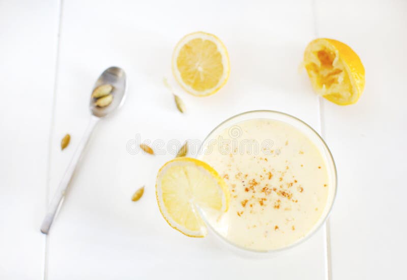 Milkshake with banana and mango, lemons, cardamom, lassi smoothie