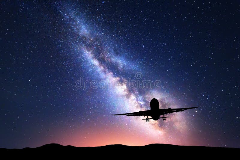 Milky Way and silhouette of a airplane