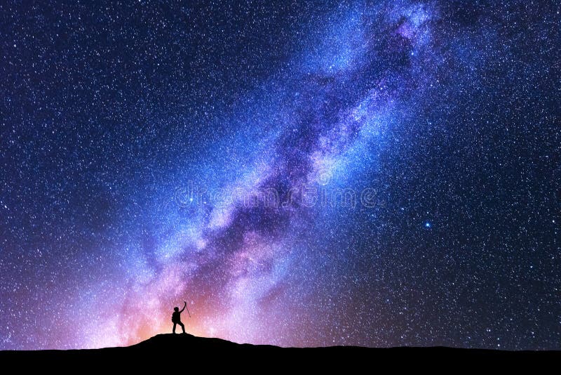 Milky Way and silhouette of happy woman. Space royalty free stock photo Milky Way and silhouette of happy woman. Space royalty free stock photo