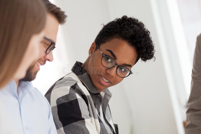 Multiracial business people in office at meeting royalty free stock photography Multiracial business people in office at meeting royalty free stock photography