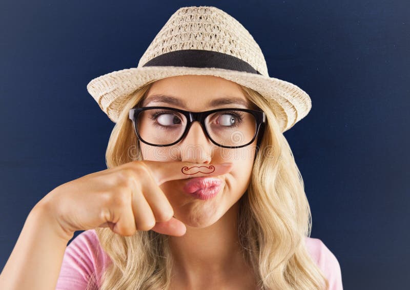 Millennials flicka med mustaschen som dras på fingret mot blå bakgrund med den vita karaktärsteckningen royaltyfria foton Millennials flicka med mustaschen som dras på fingret mot blå bakgrund med den vita karaktärsteckningen royaltyfria foton