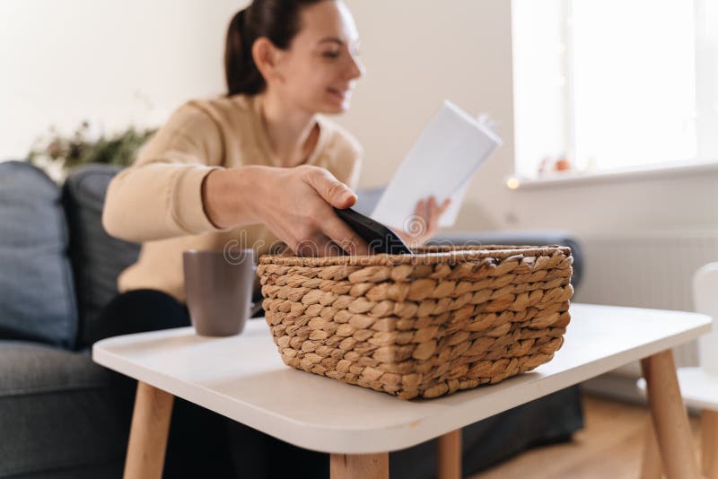 Millennial girl at home refuse using phone and reading a book. Social media addiction. Waste of time. Unplugged. Dependance concept. High quality 4k footage. Millennial girl at home refuse using phone and reading a book. Social media addiction. Waste of time. Unplugged. Dependance concept. High quality 4k footage