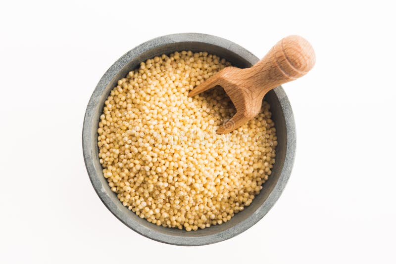 Millet groats on white royalty free stock photos