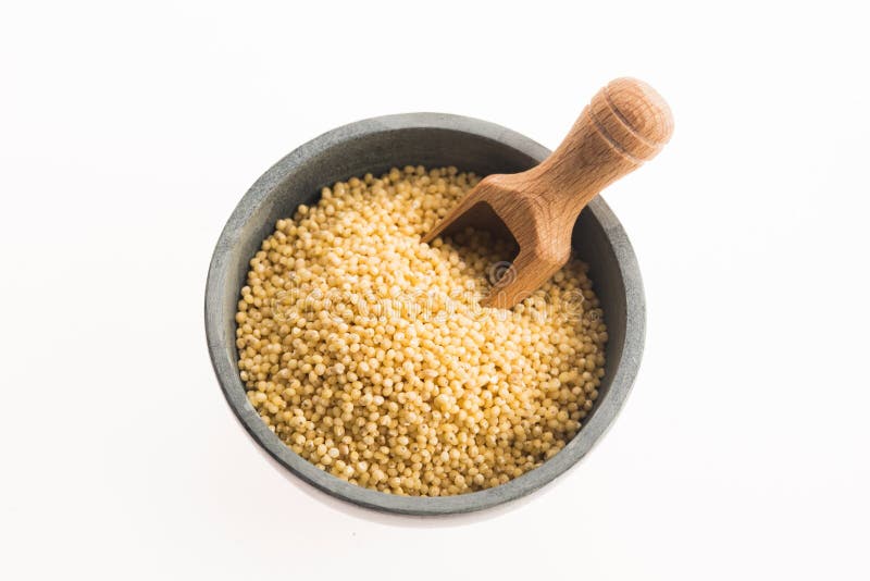 Millet groats on white royalty free stock images