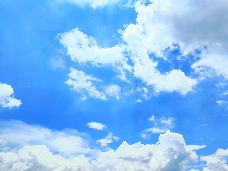 White and Dark Ash Colored Clouds on the Background of Blue Sky in  Contrasting Color. Stock Photo - Image of contrast, travel: 153856644