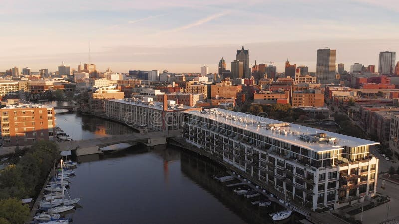 Milwaukee river in downtown, harbor districts of Milwaukee, Wisconsin, United States. Real estate, condos in downtown. Aerial view stock photo Milwaukee river in downtown, harbor districts of Milwaukee, Wisconsin, United States. Real estate, condos in downtown. Aerial view stock photo