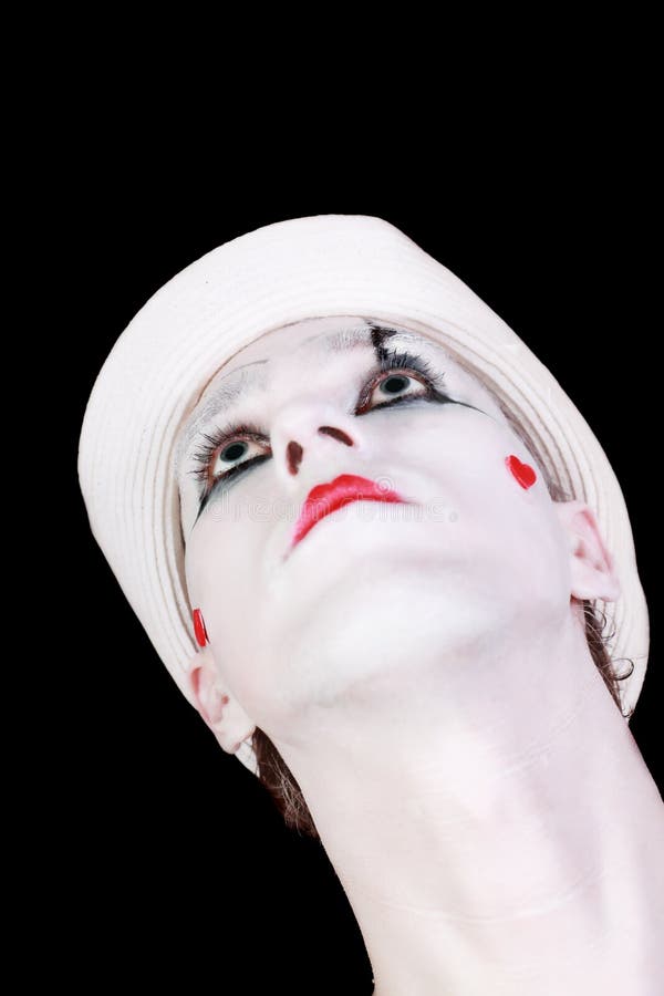 Mimo con cappello bianco isolato su sfondo nero fotografia stock