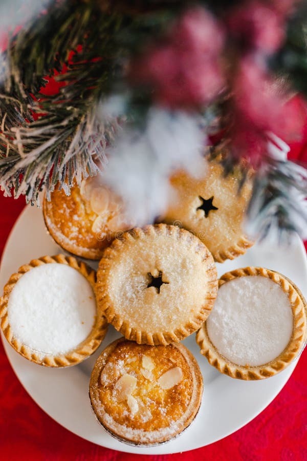 Mince Pies on Christmas Table Setting with Decorations and Tree Stock ...