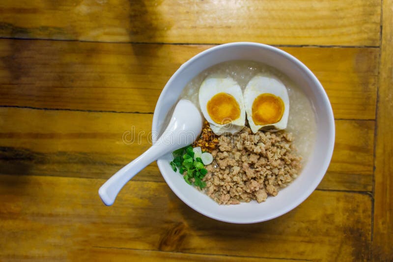 Minced pork congee with egg royalty free stock photography Minced pork congee with egg royalty free stock photography