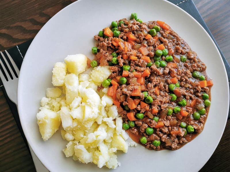 Minced and Tatties with a Fork on a Plate. Traditional Scottish Food ...