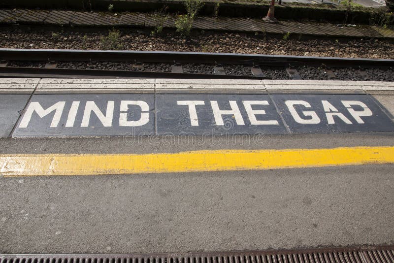 Mind the Gap Platform Sign stock photo. Image of idea - 42781018
