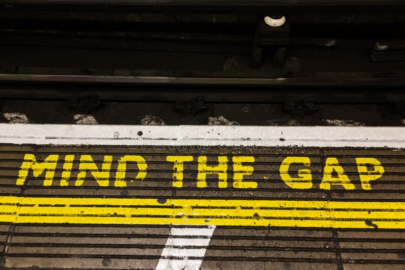 Mind the gap stock image. Image of caution, railway, letters - 79232245