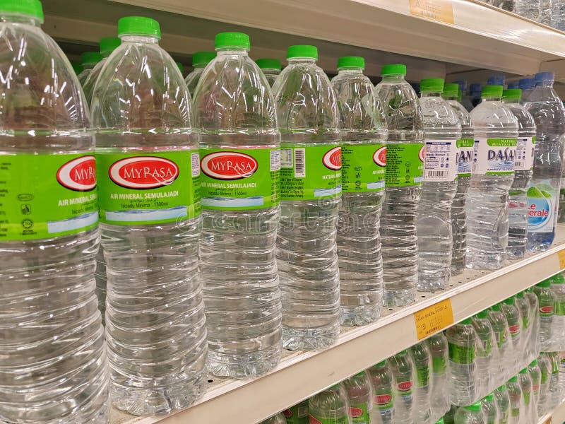 Mineral Water is Packaged in Plastic Bottles and Labeled with Various ...