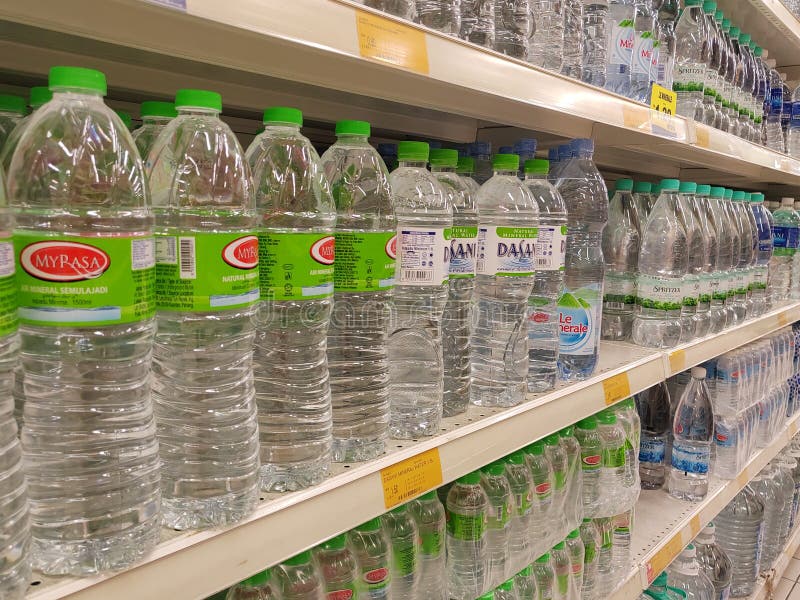 Mineral Water is Packaged in Plastic Bottles and Labeled with Various ...