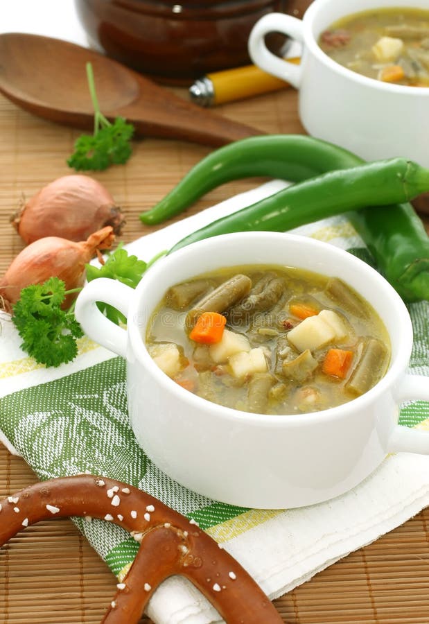 Minestrone soup with green beans, carrots and pota