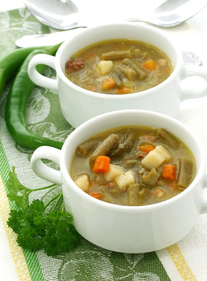 Minestrone soup with green beans, carrots and pota