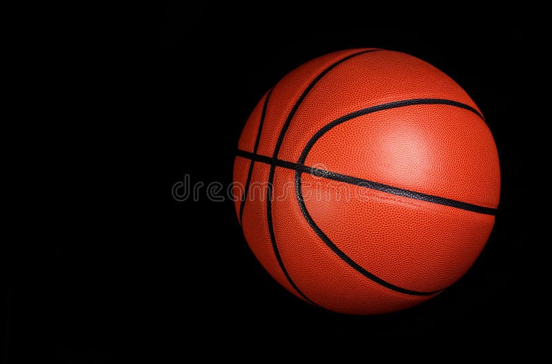 Minge de baschet peste negru stock images