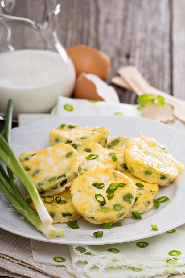 Mini frittatas with peas, green onion and feta