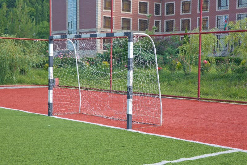 Mini Futbolowy cel Na Sztucznej trawie Futbolowy cel na zielonym gazonie zdjęcie royalty free Mini Futbolowy cel Na Sztucznej trawie Futbolowy cel na zielonym gazonie zdjęcie royalty free