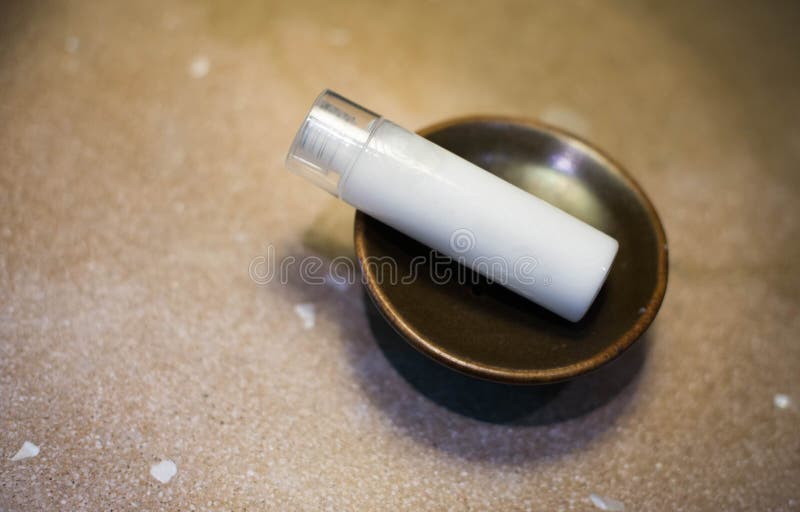 Mini lotion bottle stock photo. Image of hotel, body 93292364