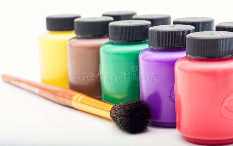 Mini paint cans and brush stock photo. Image of green 29266794