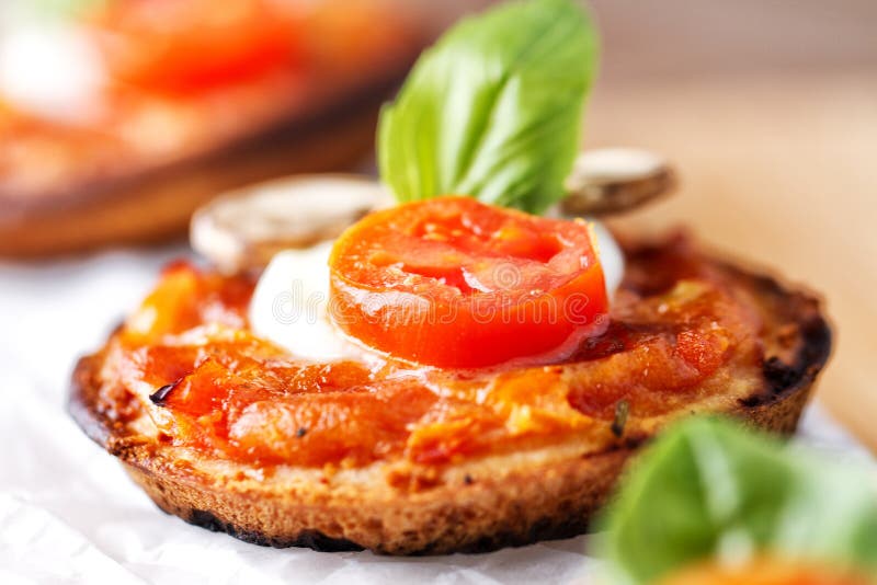 Mini Pizza Margherita with Fresh Tomato, Mozzarella, Mushrooms and