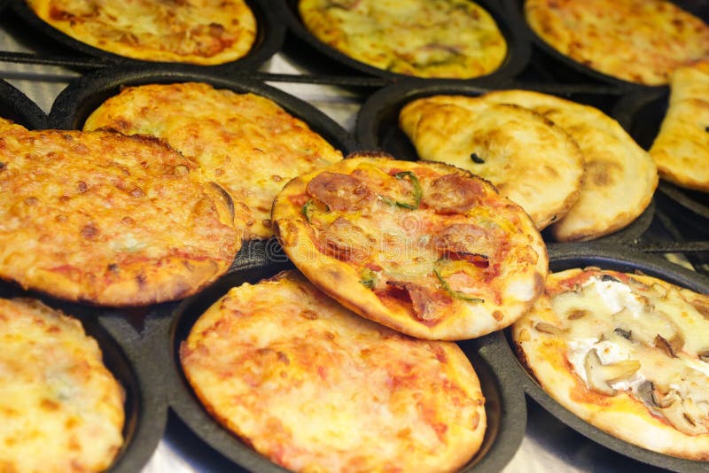 Mini pizza round slices with different topping stock photos Mini pizza round slices with different topping stock photos