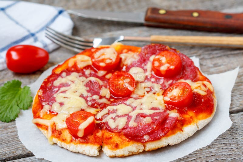 Mini pizza with salami stock image. Image of fast, oven - 88998847