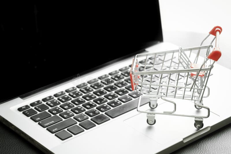 Mini Shopping Cart on Laptop with Filtered Process Stock Image - Image ...