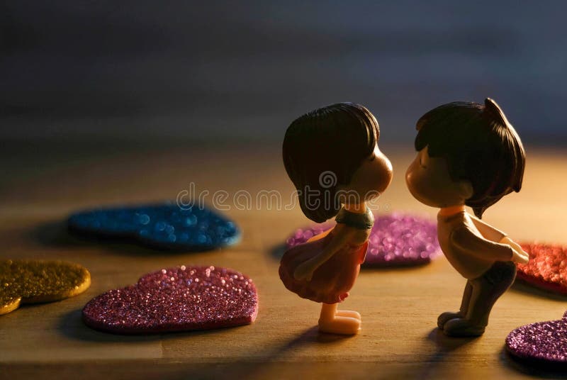 The Miniature Couple Dolls Boy and Girl Romantic Kiss at Night with Heart  Around the Ground for Background for Valentine`s Day Stock Image - Image of  heart, lover: 169558251