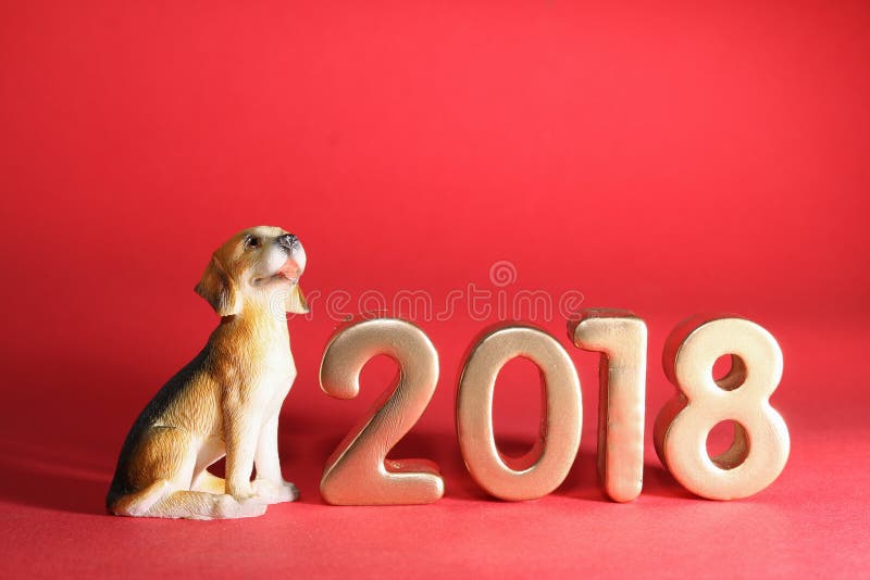 Miniature dog with year 2018