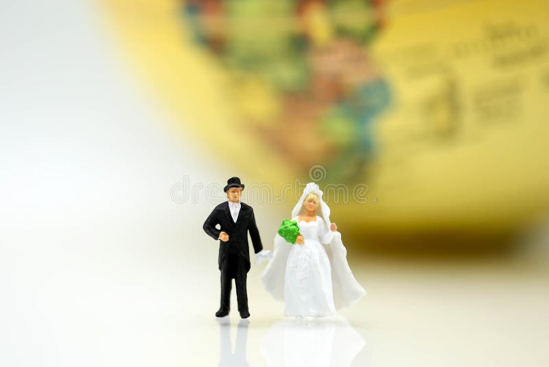 Miniature people : love couple stand with globe world map ballo stock image Miniature people : love couple stand with globe world map ballo stock image