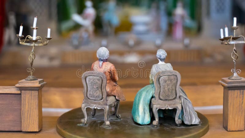 Miniature people watching theater performance play. Vintage cinema concept. miniature world stock photo Miniature people watching theater performance play. Vintage cinema concept. miniature world stock photo