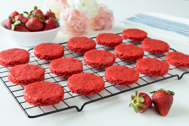 Miniature Red Velvet Cakes with cream cheese frosting and fresh strawberry topping