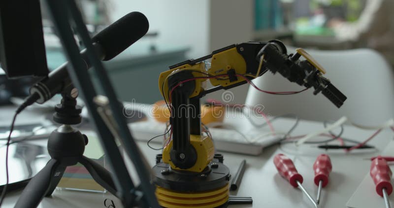 Miniature robotic arm in the science lab stock footage