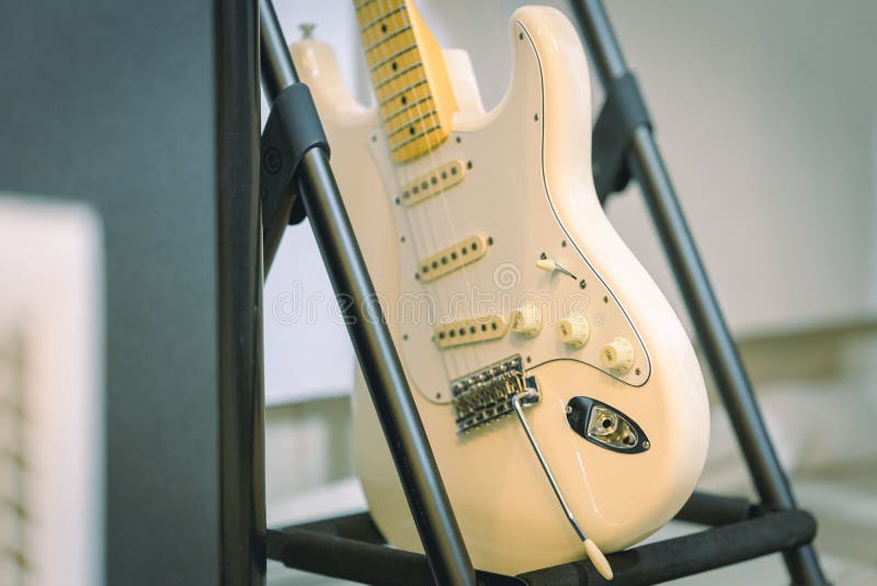 Miniature White Guitar is on Display on a Stand Stock Image Image of