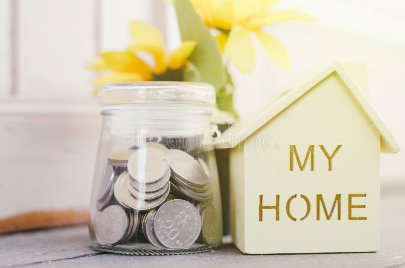 Download Wooden House With Coin In Glass Jar For Real Estate And Mortgage Concept Stock Photo - Image of housing, foreclosure: 102258216