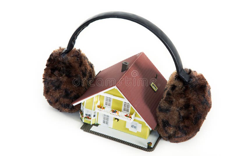 Miniaturhaus mit den Winterohren lizenzfreies stockbild Miniaturhaus mit den Winterohren lizenzfreies stockbild