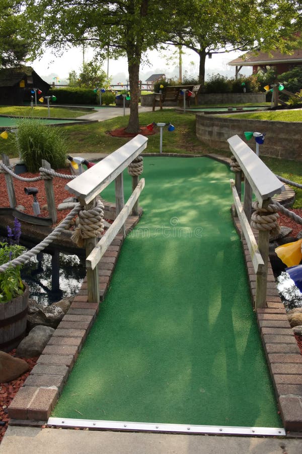 A hole at a miniature golf course. A hole at a miniature golf course