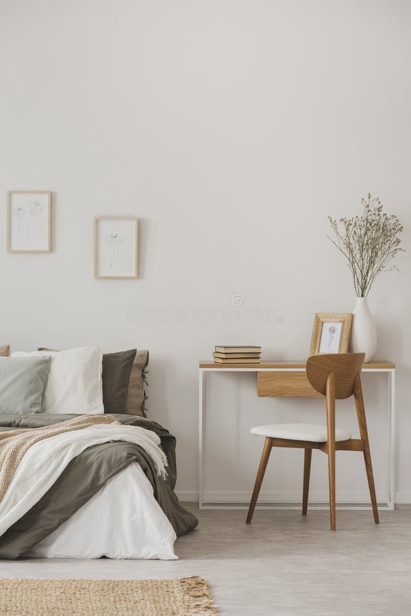 Bedroom interior with desk and wooden chair