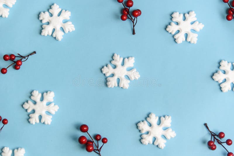 Minimal christmas, new year and winter holiday composition. Flat lay. Creative pattern banner with snow flakes nad red berries on stock photography