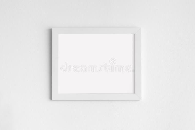 Minimal empty square white frame picture mock up hanging on white wall vector illustration