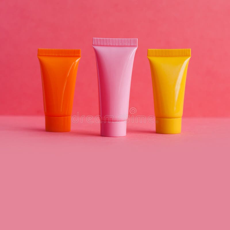 Download Minimal Cosmetic Design Three Yellow Cosmetic Tubes Package On Brown Background Blank Plastic Containers Simple Stock Image Image Of Glossy Beauty 143910831 Yellowimages Mockups