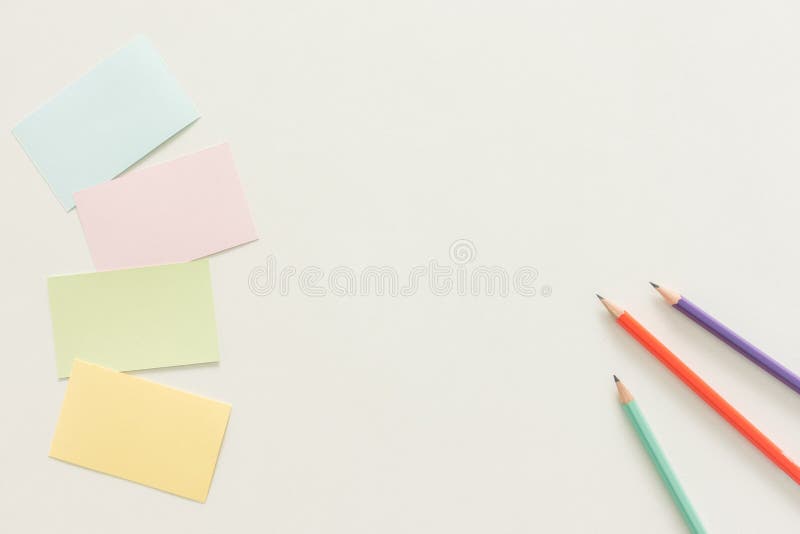 Creative flat lay photo of workspace desk with business card with blank screen on copy space white background. stock photos Creative flat lay photo of workspace desk with business card with blank screen on copy space white background. stock photos