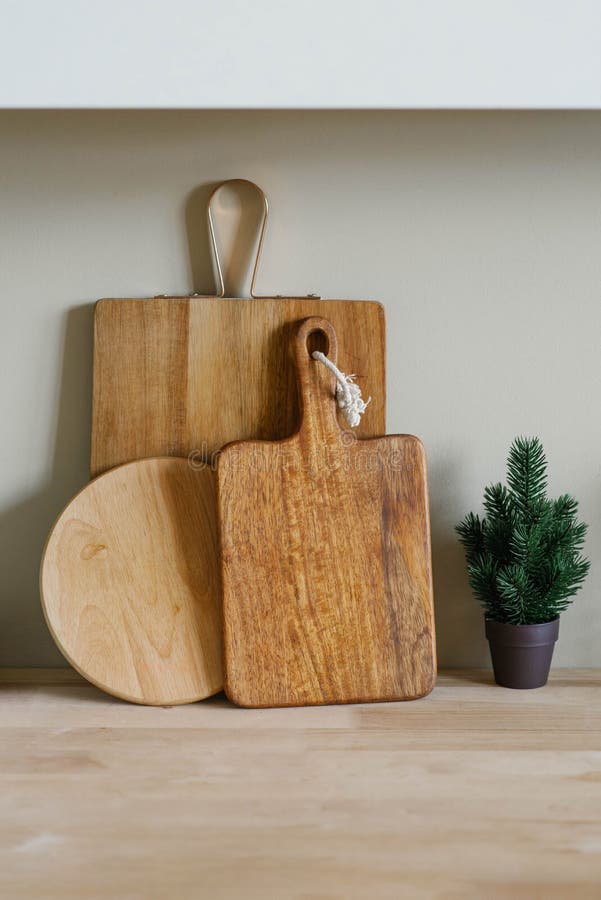 Minimalistic Christmas Kitchen Decor Wooden Cutting Boards Of Various Shapes And A Small Christmas Tree In A Pot Stock Image Image Of Desk Furniture 204094095