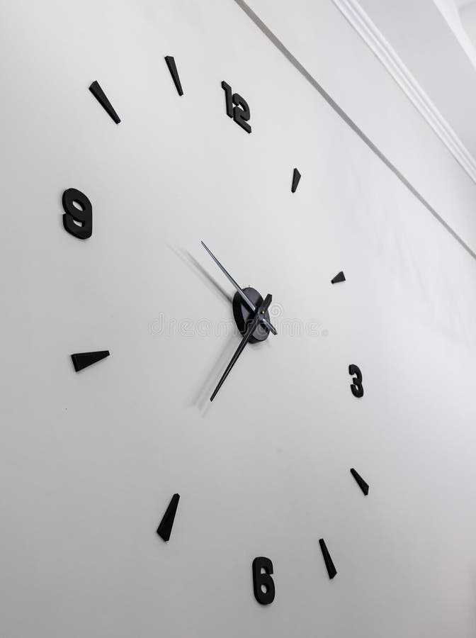 Minimalistic Design of Wall Clock with Black Numbers Stock Photo