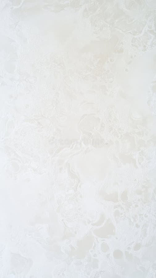 Minimalistic overhead shot of clean white desktop with subtle textures and patterns, creating serene and calming atmosphere stock photos