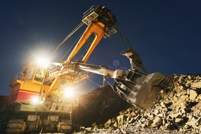 Mining Construction Industry. Excavator Digging Granite or Ore in