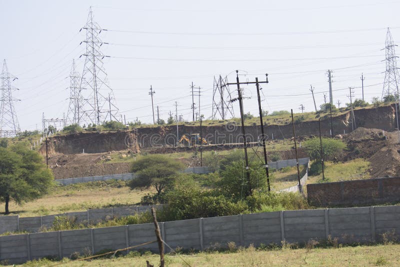 Mining at the Hill Near High Voltage Electricity Transmission Lines in